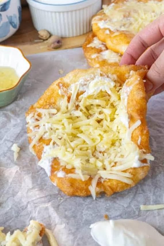 Hungarian Lángos Recipe (Traditional Fried Flatbread) bc48e9d9d436b68dae9edaba7c66f81d